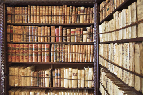 Antique books in a library.