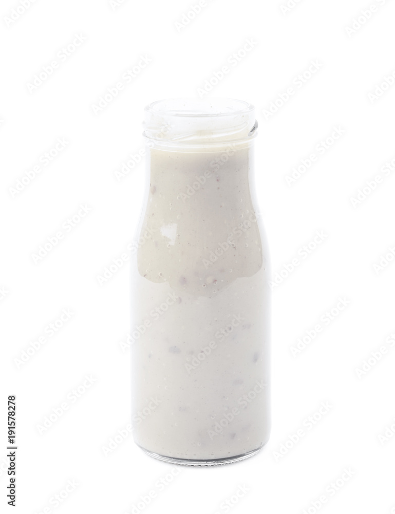 White sauce in a bottle isolated White sauce in a bottle isolated