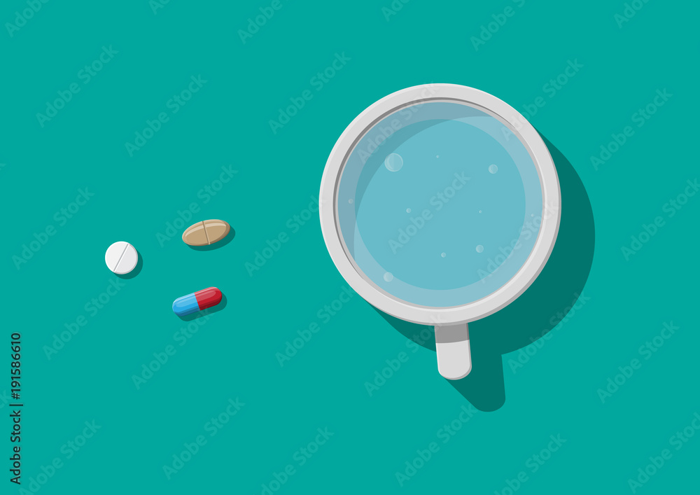Glass of water and pills. Taking medication Glass of water and pills. Taking medication