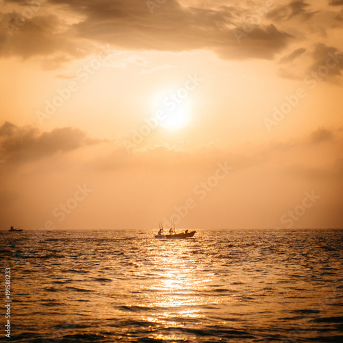 beautiful gold sunset sunrise over the Indian Ocean © MZaitsev