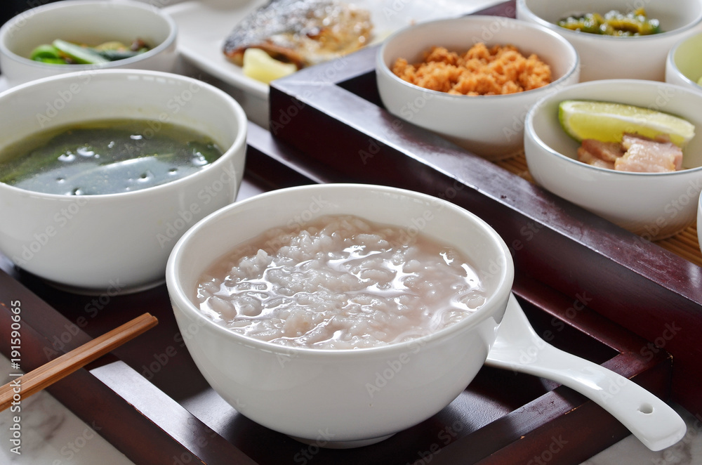 Traditional chinese rice porridge on dinner table Traditional chinese rice porridge on dinner table