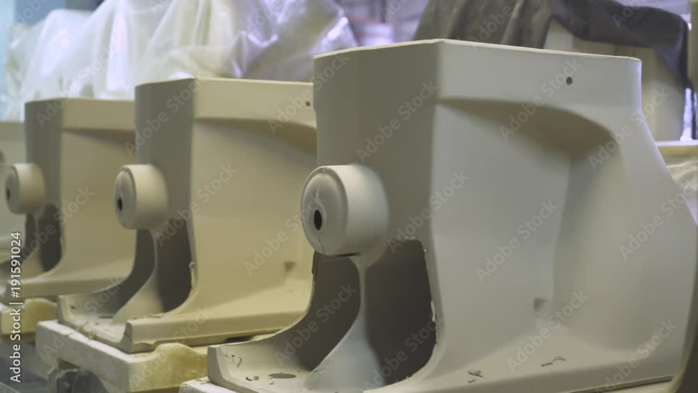 Production of ceramics, view of ceramic products sinks and toilets, conveyor.
Production of ceramics, view of ceramic products sinks and toilets, conveyor.