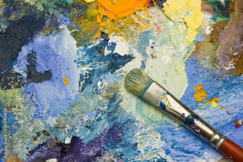 Slika na platnu Artists acrylic paint palette close up semi abstract background