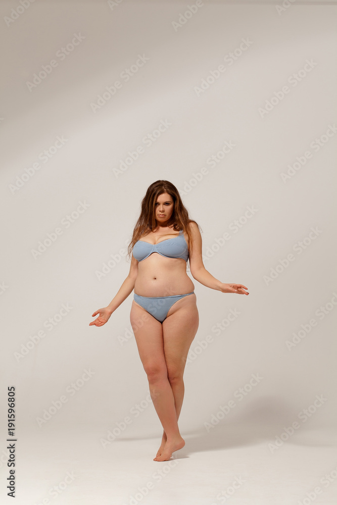 Full length portrait of fat girl in underwear. Diet concept. Stock Photo |  Adobe Stock