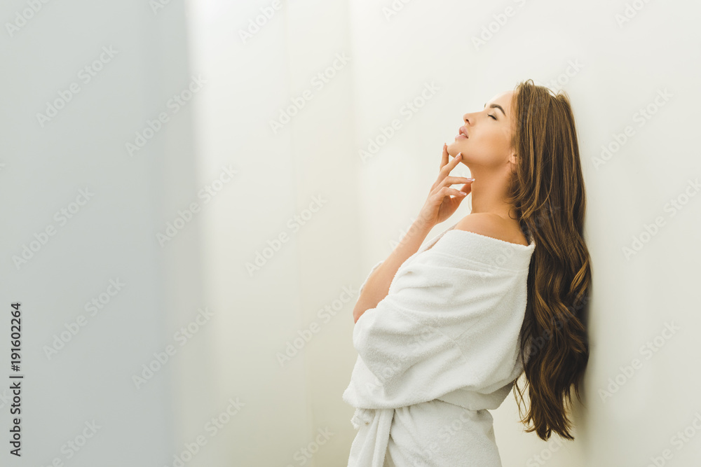 side view of attractive sensual woman in bathrobe at home side view of attractive sensual woman in bathrobe at home