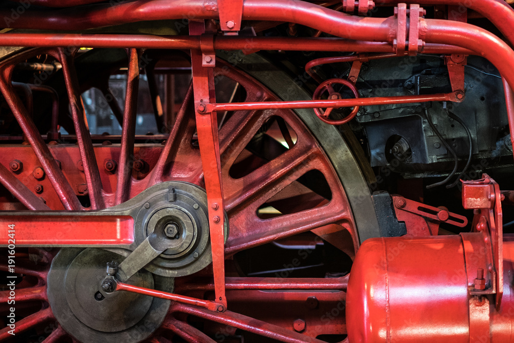 old steam locomotive wheel closeup - old transport technology