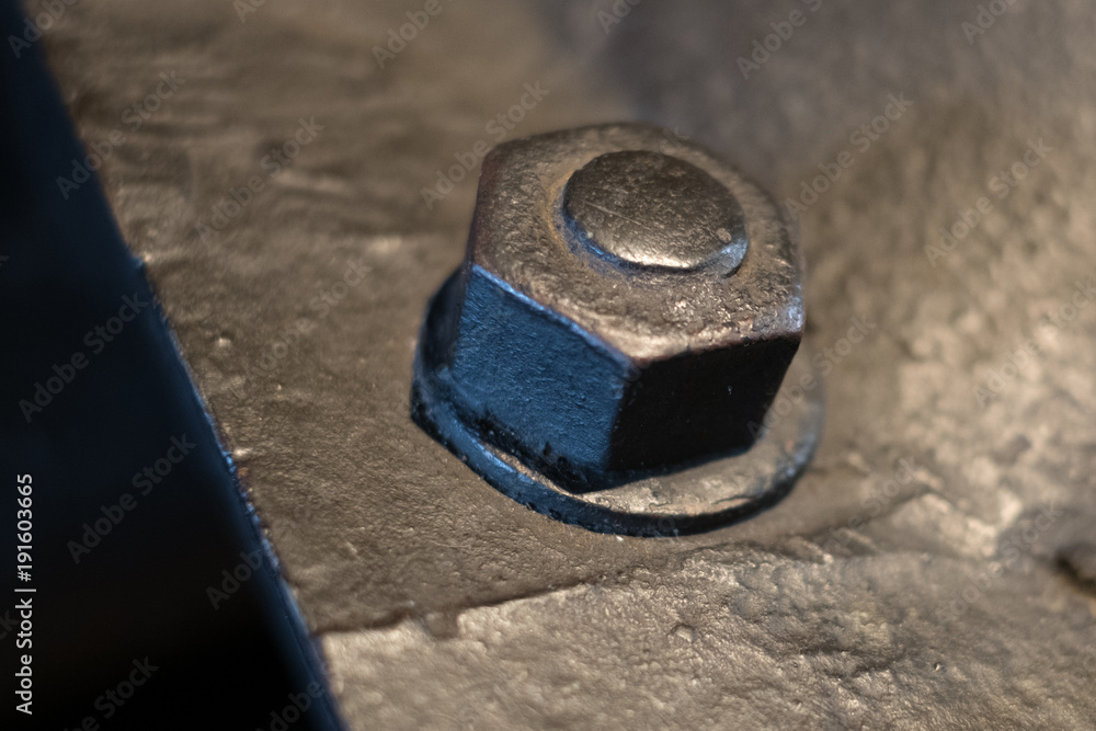 bolt and nut closeup on metral background