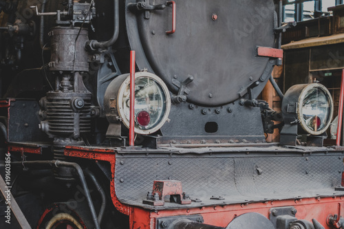 Front view of a classic old steam locomotive