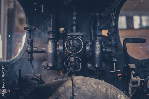 vintage technology - valves and handles inside old machine