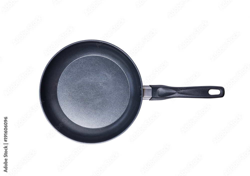 Top view empty black iron pan isolated on white background. File contains a clipping path. Top view empty black iron pan isolated on white background. File contains a clipping path.