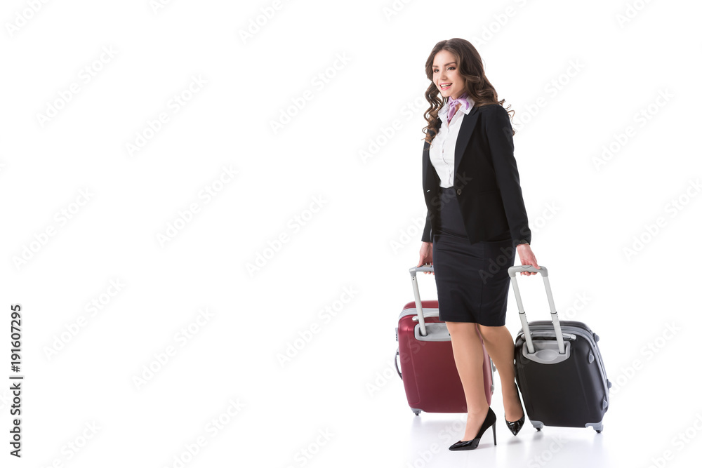 beautiful stewardess with bags on wheels isolated on white beautiful stewardess with bags on wheels isolated on white