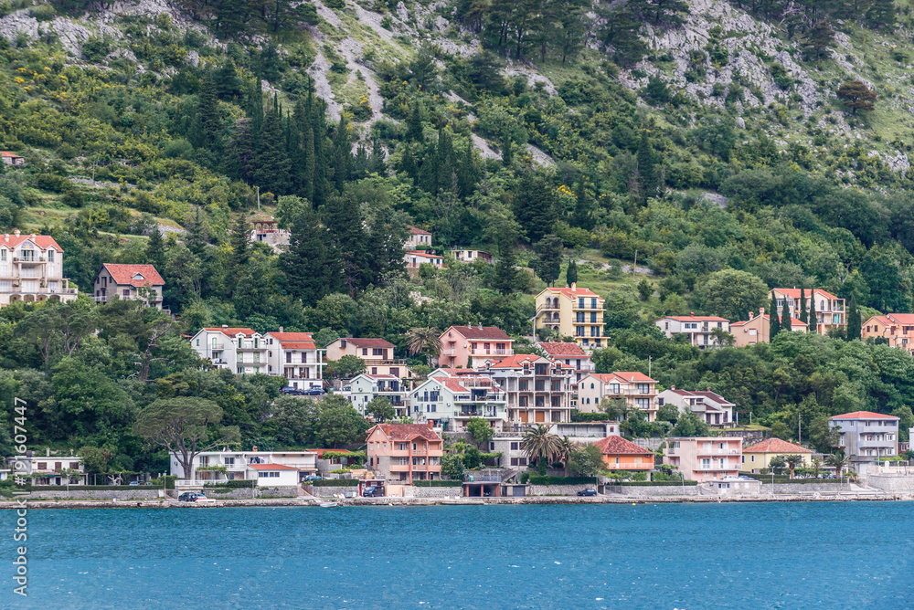 Distance view on small Muo town in the Kotor Bay, Montenegro