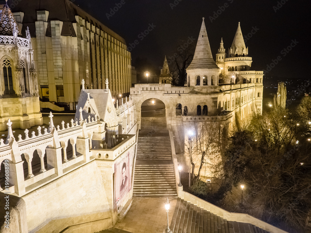 Buda Castle lit up at night in Budapest, Hungary.