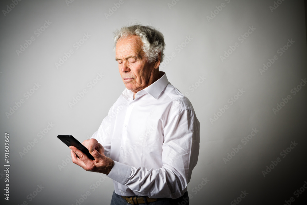Old man and smart phone. Old man and smart phone.