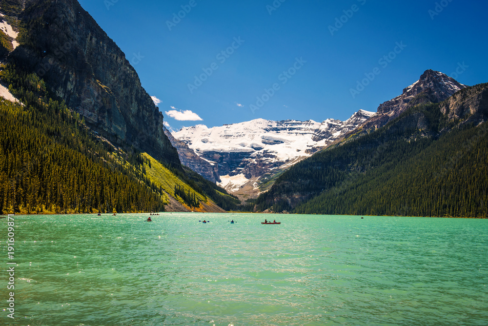 Lake Louise surrounded by mountain peaks and glaciers Lake Louise surrounded by mountain peaks and glaciers
