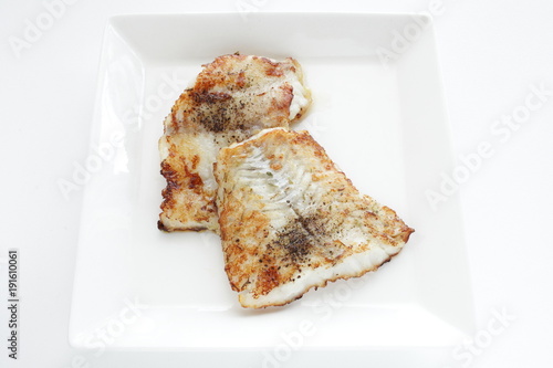 sautted black pepper on white flat fish  photo