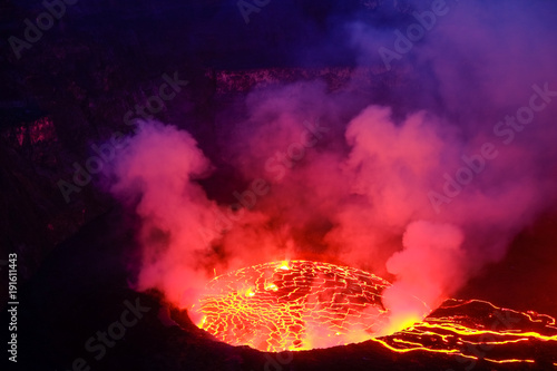 Lava and steam in crater of Nyiragongo volcano in Virunga National Park in Democratic Republic of Congo, Africa