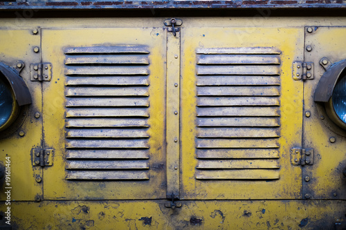 metal doors   front grill of an old locomotive   historic railroad