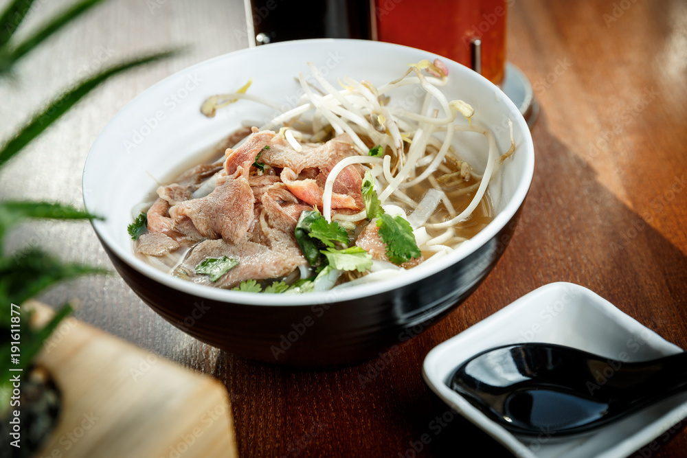 Ramen soup with veal meet and sprouted soybean in a bowl Ramen soup with veal meet and sprouted soybean in a bowl