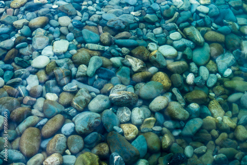Underwater sea stones. sea water and pebbles © EwaStudio