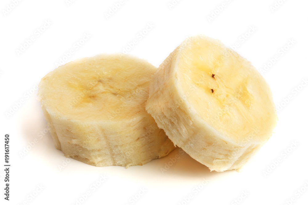 Banana slices isolated on a white background. Flat lay, top view Banana slices isolated on a white background. Flat lay, top view
