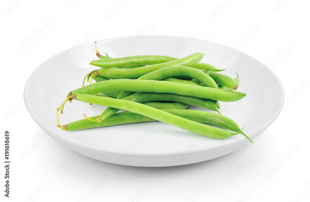 green beans in plate on white background green beans in plate on white background