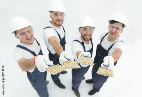 team of construction workers looking at the camera