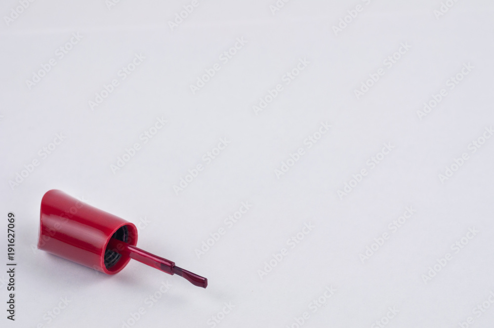 New brush for gloss nail polish on white background New brush for gloss nail polish on white background