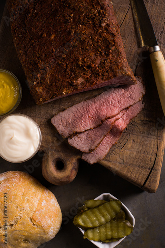 Sliced homemade pastrami photo