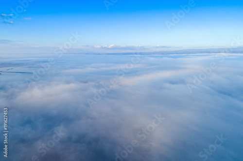 Aerial View. Flying over the clouds .