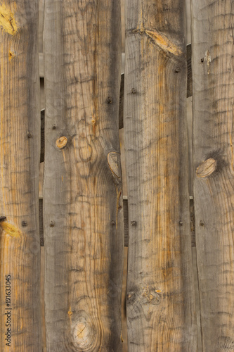 Wall maden of wooden planks as a texture or background photo