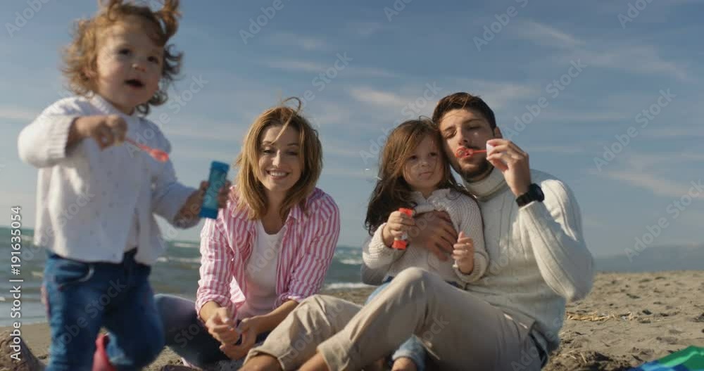 Young Familly Making Fun On The Beach Young Familly Making Fun On The Beach