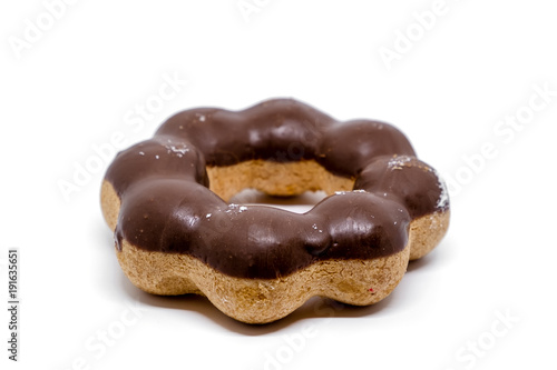 Delicious chocolate doughnut, a small fried cake of sweetened dough on white background for snack food concept