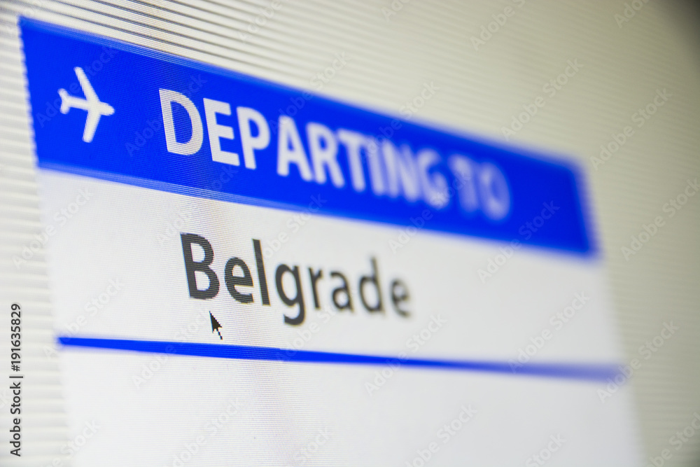 Computer screen close-up of status of flight departing to Belgrade, Serbia Computer screen close-up of status of flight departing to Belgrade, Serbia