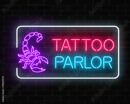 Tattoo parlor glowing neon signboard with scorpio emblem. Tattooing salon sign in rectangle frame.