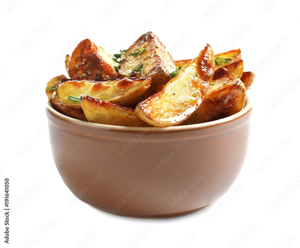 Bowl with tasty potato wedges on white background Bowl with tasty potato wedges on white background