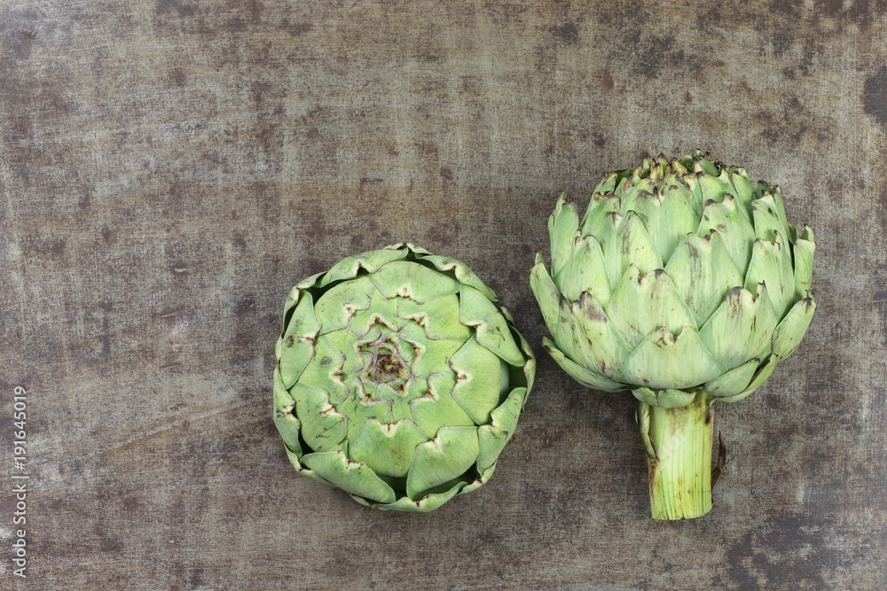 two artichokes on a white background two artichokes on a white background