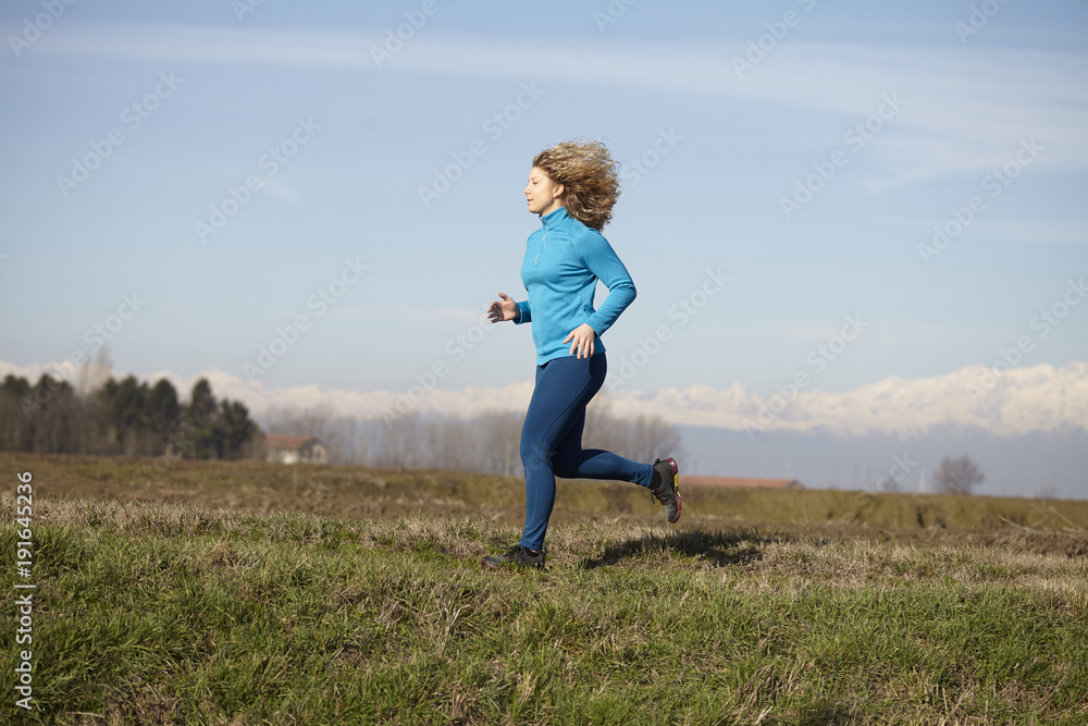 woman running in fall winter season