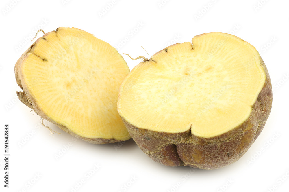 one fresh cut turnip(Brassica rapa rapa) on a white background