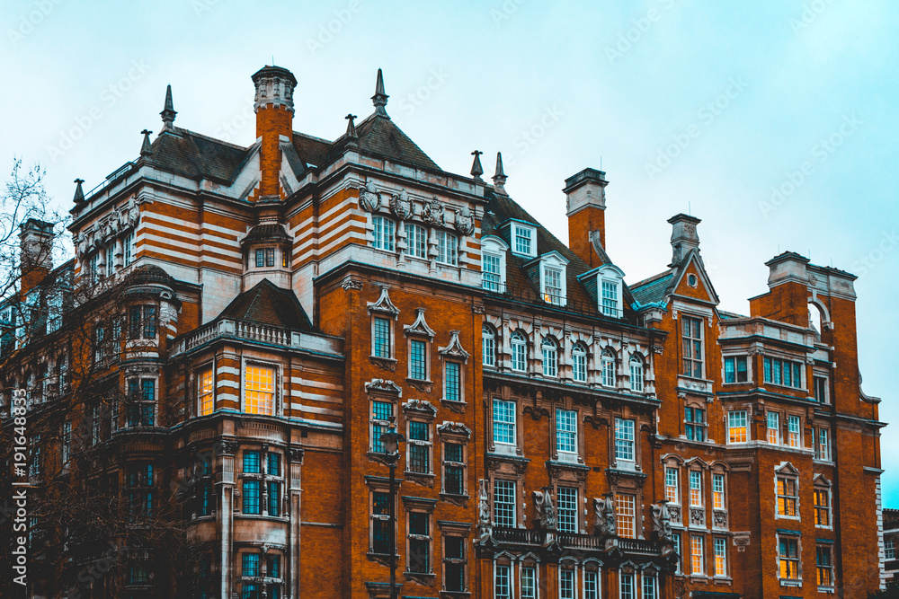 majestic orange brick building in the heart of london