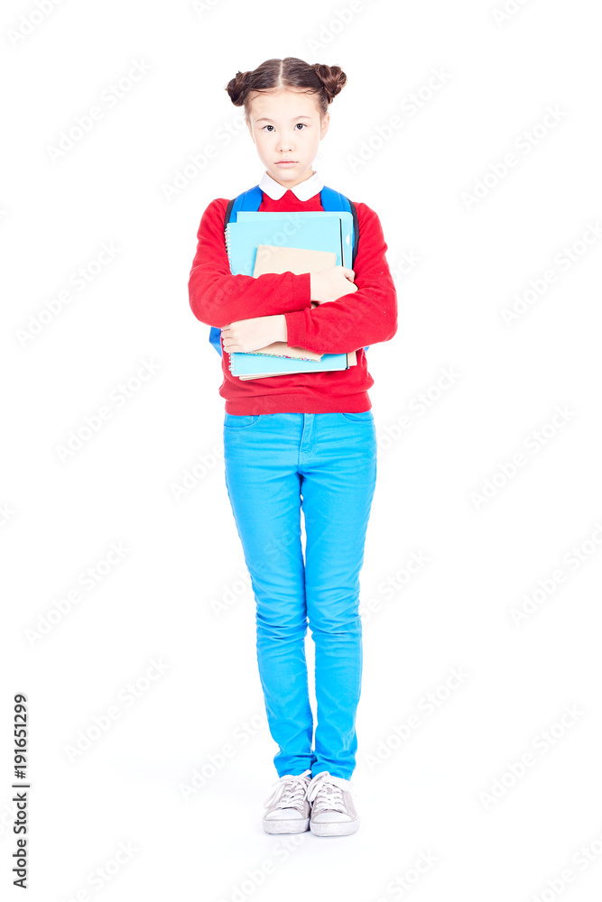Portrait of female student holding notebooks and textbooks on white background Portrait of female student holding notebooks and textbooks on white background