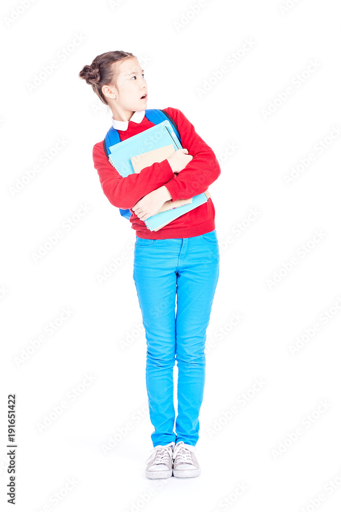 Portrait of female student holding notebooks and textbooks on white background Portrait of female student holding notebooks and textbooks on white background