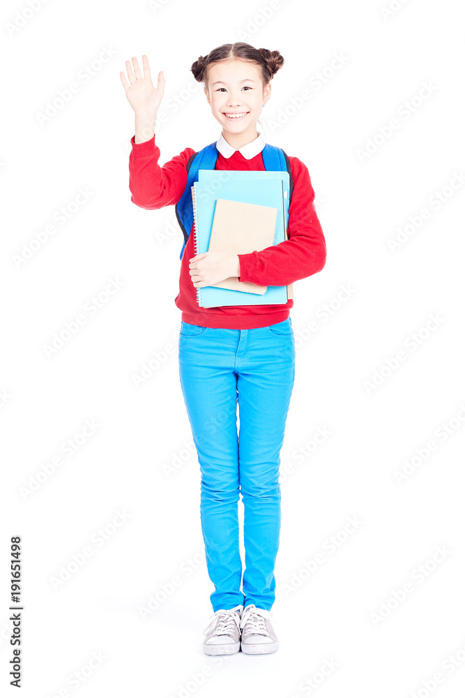 Portrait of female student holding notebooks and textbooks on white background Portrait of female student holding notebooks and textbooks on white background