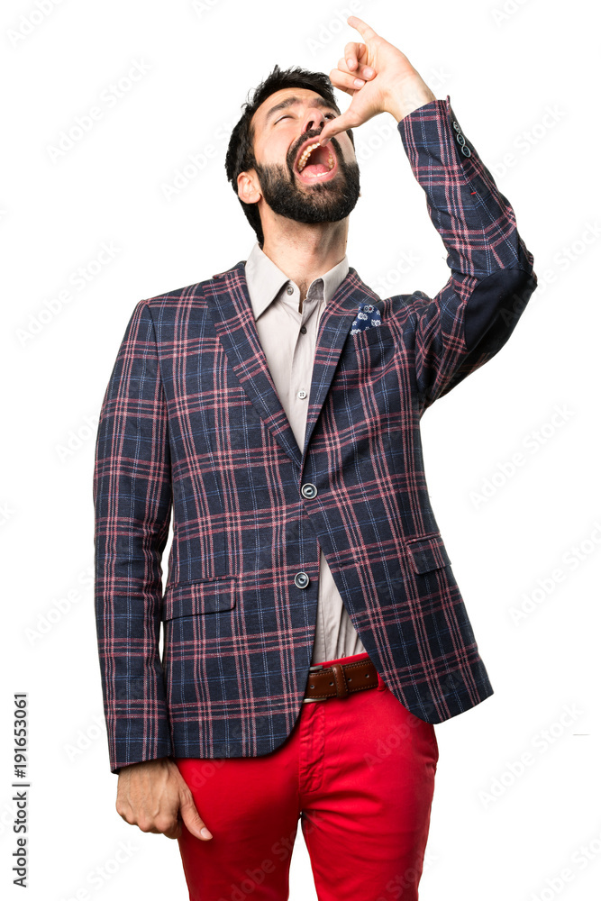 Well dressed man making drunk gesture on white background Well dressed man making drunk gesture on white background
