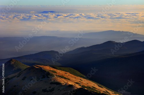 Fototapeta Naklejka Na Ścianę i Meble -  Poland, Tatra Mountains, Zakopane - Urhocie Kasprowe and Kopa Magury peaks with Beskidy Mountains in background