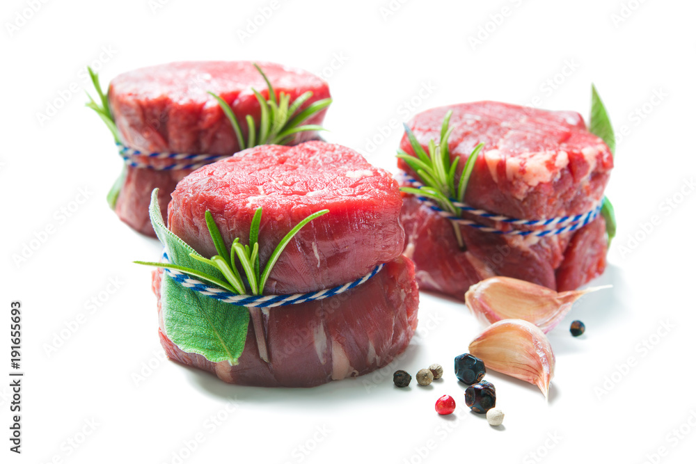 Raw beef fillet steaks mignon isolated on white background