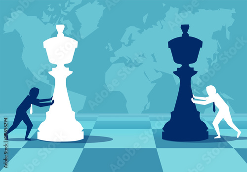 Men building strategy playing chess
