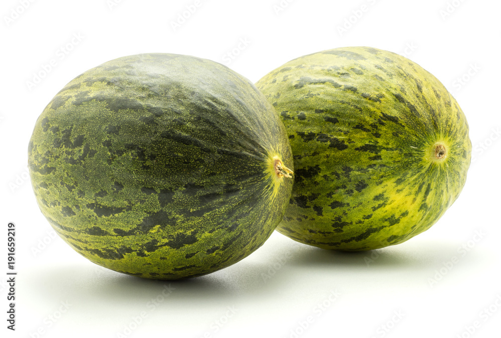 Two melons Piel de Sapo (Santa Claus Christmas variety) isolated on white background green striped outer rind. Two melons Piel de Sapo (Santa Claus Christmas variety) isolated on white background green striped outer rind.