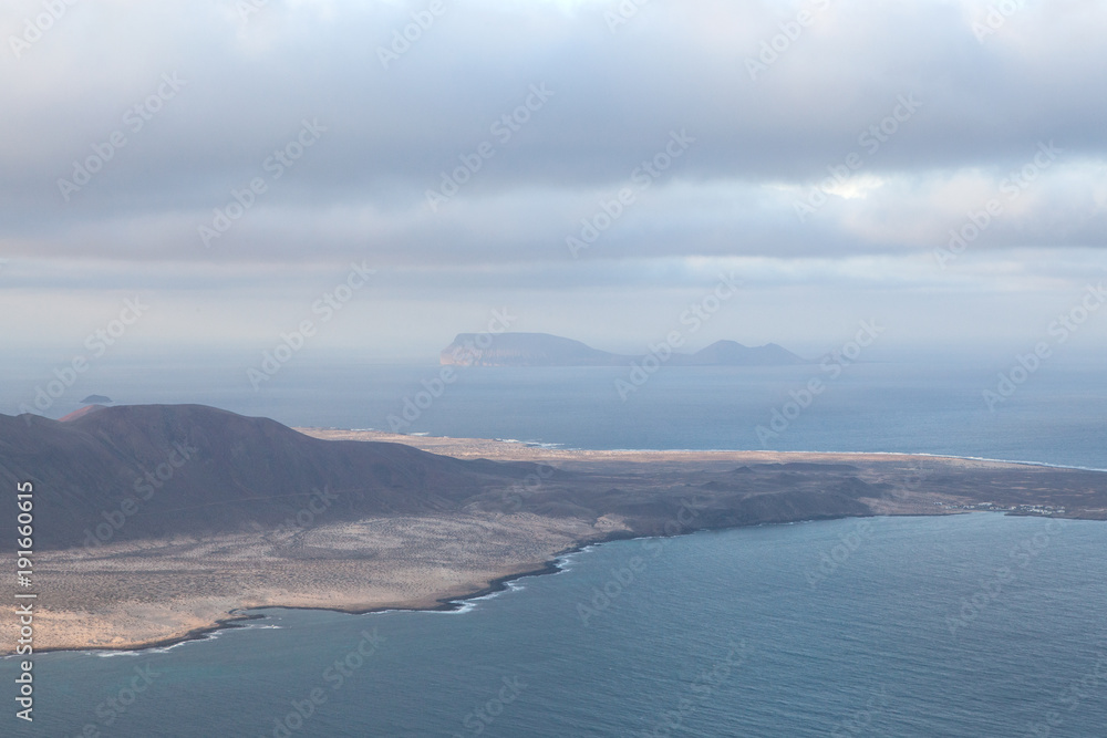 Mirador del Río, Lanzarote / Spain, January 24 2018: View of the East end of La Graciosa from the Mirador del Río with the Isla de Alegranza on the background