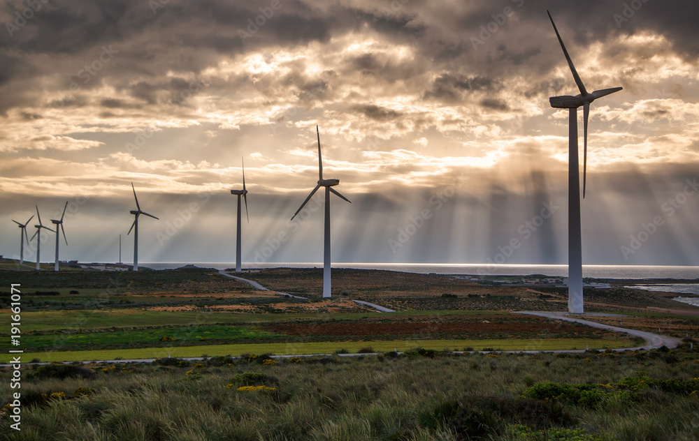 custom made wallpaper toronto digitalThe Wind turbine stand with amazing nature of the sun ray and cloudy. In Tunisia has nature energy and there is the one of landmark in Tunisia, Alternative and clean energy concept.